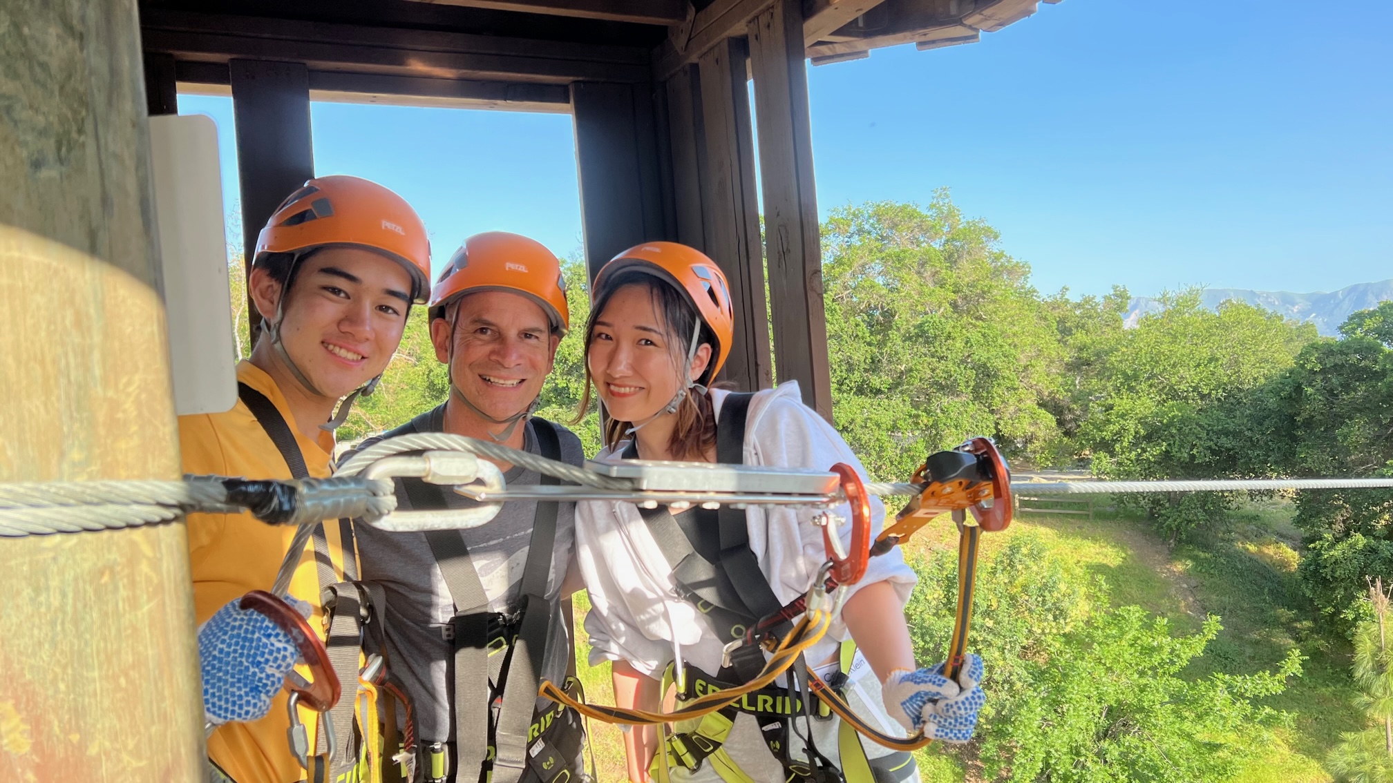 A group of people at a zipline